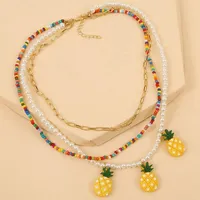 Anhänger Halsketten Mehrschichtige Halskette gefälschte Perle Ananas Dekor Perlen Schmuckzubehör Strandparty Kleid für Frauen
