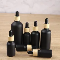 Matte Black Glass e liquid Essential Oil Perfume Bottle with Reagent Pipette Dropper and Wood Grain Cap Packing Bottles a48