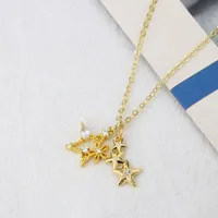 Colliers pendants Dreammy Starry Charm Gold Zircon Géométrique Star pour femmes Gadies Metal Copper Clavicule Chaîne de bijoux