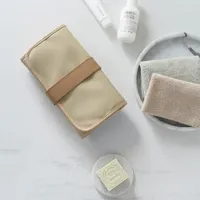 Semplice sacchetto di stoccaggio cosmetico portatile grande capacità di lavaggio impermeabile in pelle da viaggio