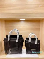 Designer- Classic Smiley Face Bagbag Único e Reconhecido Bolsas Bolsas de Moda Vestidos disponíveis em dois tamanhos Preto