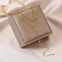 Ожерелья кулон Ожерелья против увядающего свитера цепи рисовые зерна кисточка двухслойное титановое стальное ожерелье женщин преувеличенные