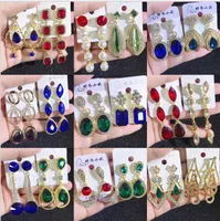 Fast ship European and American retro Bohemian aristocratic long earrings female rhinestone glass palace style color exaggerated earrings mixed batch
