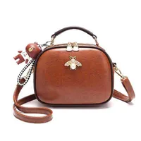 round leather handbolsa