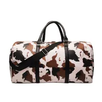 Brown Whowhide Travel Bag Warehouse 20pcs الكثير من السعة الكبيرة بقرة فو فو من الجلد القراصنة المخصصة لتصميم Duffle Handbag بين عشية وضحاها Weekend Bags Dom1065