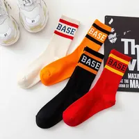 Orange hip hop personality letter ins medium tube socks men's and women's fashion brand skateboard stockings European and American street