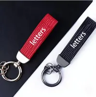 2021 Das mulheres anéis chave mans chaves de moda cadeia letras padrão chave keyring schoolbag decorar saco charme acessórios3 estilos