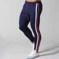 Pantaloni della tuta da jogger bianchi uomini casual pantaloni di cotone magro palestra di fitness wlitness pantaloni maschio pista da binario sportivo primavera