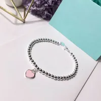 2021 Tillgängliga Hängsmycke Halsband Silverbollar Rostfritt stål Tjocka pärlor med rosa hjärtaplatta som kommer blå låda och dammväska
