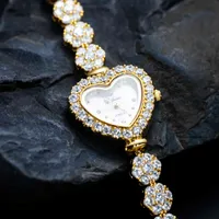 高品質のトップブランドの高級ブリンのフルダイヤモンドメッキのアイスアウトヒップホップの女性リストラインストーンウォッチレディース腕時計