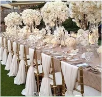 シンプルだがエレガントなホワイトシフォンの結婚式の椅子カバーとサッシのロマンチックなブライダルパーティー宴会チェアバック結婚式の好意