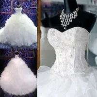 2019 Bollkakor Bröllopsklänningar med pärlstav Bodice Sweetheart Corset Royal Princess Gowns Ruffled Organza Chapel Train Bröllop Bröllopklänningar