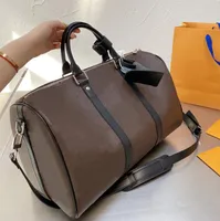 Homem Mulheres Luxurys Designers Sacos 2021 Bolsas Designer Esporte Ao Ar Livre Duffel Bags Grande Dapacidade Top Quality Travel Bag