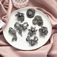 Kimter Gran Bowknot Broche Pines Women Vintage Pearl Crystal Button Pin Rhinestone Flower Broches Accesorios de Joyería 16 Estilos K128FA
