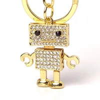 Nyckelringar mode smycken nyckelring söt robot nyckelkedja legering väska hängsmycke bil män och kvinnor gåvor stormarknad