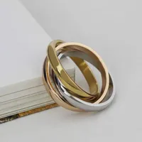 結婚指輪ファッション女性クラシック3ラウンドリングローズゴールドシルバーカラーステンレススチールトリプルドームローリングスタックパーティーサイズ5-10