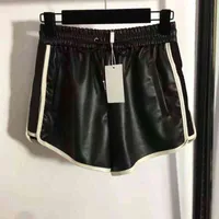 Neue Mädchen Damen Leder Kurzmode Side Boy Bibbon Splicing PU Pants Shorts