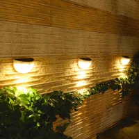 Lámparas solares LED Lámpara de pared al aire libre impermeable Patio Paisaje Luz de calle Power Garden Cerca de la iluminación Decoración