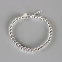 Glatte 6-mm-Perlen-Armband-Stränge personalisierte Mode-Joker-Kleidung Zubehör Galvanisieren Platin-Schmuck-Geschenke für nette Mädchen