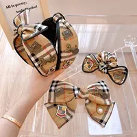 Ornamento coreano Dongdaemun grazioso influencer online classico B plaid bow fascia set clip capelli anello