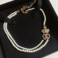 Collier double perle Femmes bijoux designer Couronne Pendentif Collier de luxe Haute Qualité Colliers de mode de haute qualité Perla Collier Chaîne D2111051HL