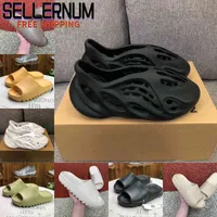 도매 2021 뉴 카니스 웨스트 슬리퍼 남성 여성 뼈 지구 브라운 사막 모래 슬라이드 수지 패션 신발 샌들 거품 러너 트레이너