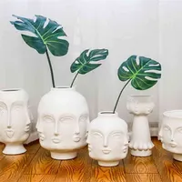 Flores de vaso de cerâmica de rosto criativo, decoração artificial branco decoração nórdica casa 210825