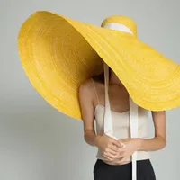 حافة واسعة القبعات مخصص 100CM قبعة الشاطئ المتضخم للنساء الأصفر القش الطبيعي uv حماية طوي مصمم فاخرة المنصة