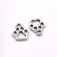 Alloy Hollow Dog Paw Charm Colgante para joyería Hacer Pulsera Collar DIY Accesorios 11x13mm Antiguo Silver 500pcs
