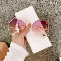 Gafas de sol Moda para mujer Lente de corte sin montura Metal Damas Gradient Tea Personlity Shade Sun Glasses Outdoor UV Protección