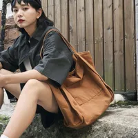 Schoudertassen hong kong stijl grote capaciteit eenvoudig canvas tas vrouwelijk draagbare milieubescherming winkelen