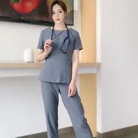 Uniformi del personale Abiti Abiti a manica corta Scrub per infermieristica Dental Clinic Abbigliamento per le donne Top e Pants Sets Due pezzi delle donne