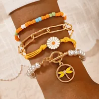 4pcs / ensembles de bracelets perlés colorés pour femmes belles fleurs de libellule de libellule à la main corde réglable bijoux bohémien