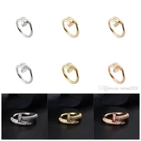 Anel de unhas Anéis dos homens Anéis de luxo Clássico Designer de luxo Jóias Mulheres Titânio Liga de Aço Banhado Ouro 3 Cores Ouro / Prata / Rosa Nunca Fade não alérgica