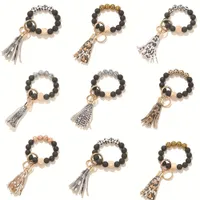 Fashion Black Grosted Wood Berde Bracelet Keychain Keychain Chain Mather Tassel Pendant Bracelets Femme Girl Key Ring Keyring Solte de bracelet ACCESSOIRES