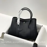 Modedesigner Gartenbeutel 30 cm Damenhandtaschen Luxurys Retro Retro gro￟e Kapazit￤t Party Tasche 2023 Damen Crossbody -Umh￤ngetaschen Cowhide