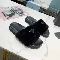 Diseñadores de lujos para mujer zapatillas de lana deslizamiento de invierno piel esponjosos peludo letras sandalias calientes cómodas diapositivas Fuzzy Girl Flip Flop Slipper
