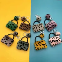 Pompoms chaveiro anéis saco de leopardo chaveiros mini fofo carteira de pelúcia pingente charme jóias mulheres bolsa keyfobs acessórios