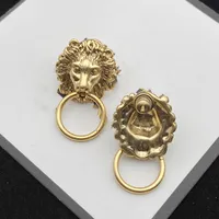 Nuevo producto Pendientes chapados en oro de bronce de alta calidad Diseño de moda retro Pendientes de león Joyería redonda Suministro