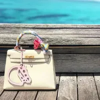 2021 Mode Marke Echtes Leder Hohlpferdkopf Tasche Schlüsselanhänger Ring Frauen Charme Handtasche Anhänger Keychain Zubehör