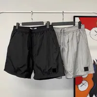 Pantalones cortos para hombre de diseño pantalones cortos pantalones cortos de pista de verano fondos de playa con buque de bolsillo de bolsillo joggers joggers unisex Outwears con cordón ajustes de ajuste S-3XL