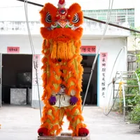 Mascota muñeca disfraz naranja buda traje león león sur de dragón danza león danza surhern wake-up dragon grúa pila danza