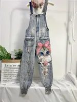 Jumpsuits femeninos Jugares Mujeres impresas Cartoon Cat Jobsuit de mezclilla Pantalones de jean con cuentas sueltas Pantalones