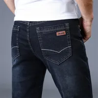 Męska klasyczna marka dżinsów duży rozmiar prosty pantelon homme Jean Slim, zaniepokojony designem spodnie motocyklowe pasy tanio czarne regularne C19042101