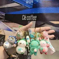 Keychains Cartoon creative sleepy rock panda car key chain pendant dripping rubber doll fashion student PVC gift