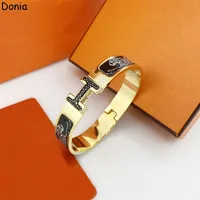 Donia Jewelry Luxury Bangle Европейская и американская модная эмалевая эмаль леопарда титана стальной писем браслет с сумкой