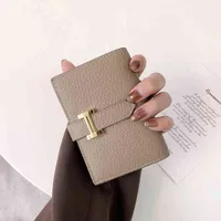 Top -Layer Cowhide Small Card Bag Female Designermagnetische Multi -Position Light Luxury Leder Mini 10 Zertifikat 1W5T