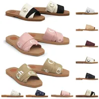 Original sandaler berömda designer kvinnor woody tofflor muls platt chole sandaler glider kanvas vit svart segel kvinnor mode utomhus strand toffel skor