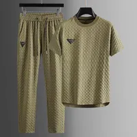 Erkeklerin Trailsuits Moda Erkekler Sıradan İki Parça Setleri Kısa Kollu T-Shirtler Uzun Pantolon Takım Desen Baskı Kıyafet Erkek Sokak Giyim M-4XL