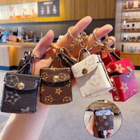 4Colors Cute Presbyopia Leather Cartoon KeyChain Coin Purse Headset Mini School Bag Design Tassel Key Ring PU Leather Car Keychains Jewelry Bags Charm Gold Chains